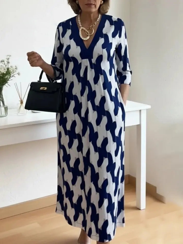 Elara – Midi Kleid mit künstlerischem Print und V-Ausschnitt