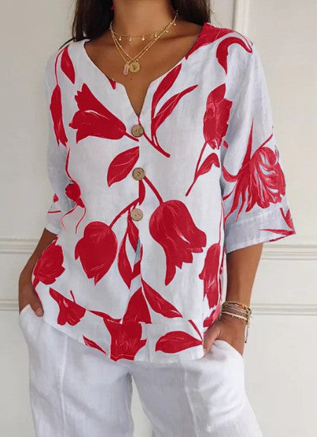 Despoina – Elegantes Blumentop mit Knöpfen