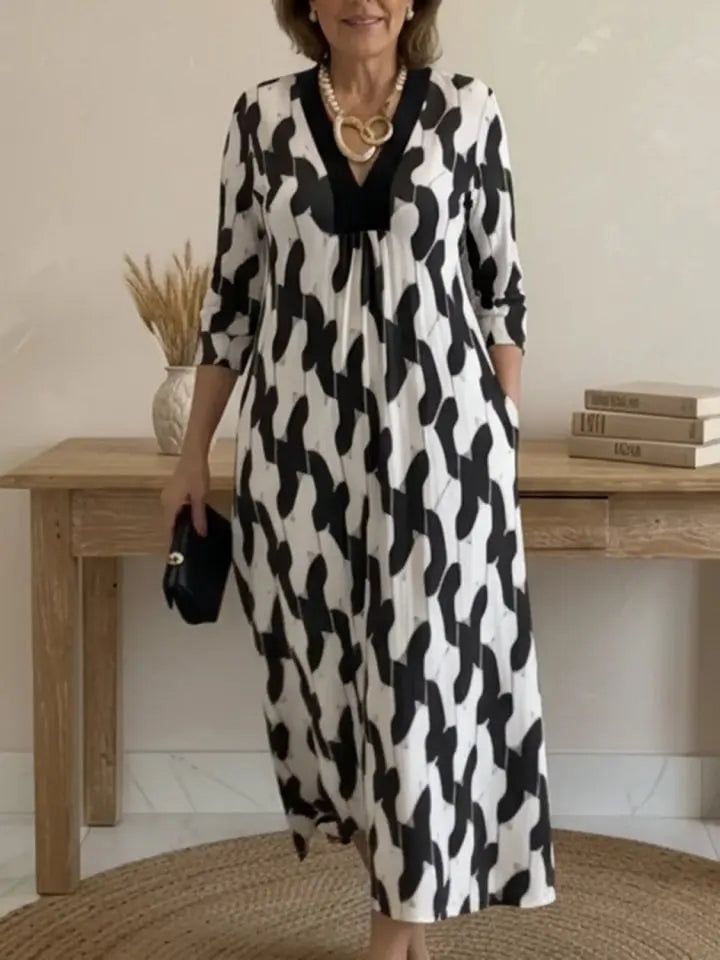 Elara – Midi Kleid mit künstlerischem Print und V-Ausschnitt