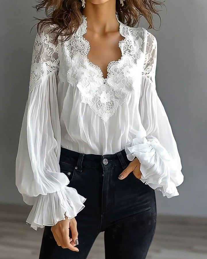 Joelle | Elegante Spitzenbluse mit Puffärmeln