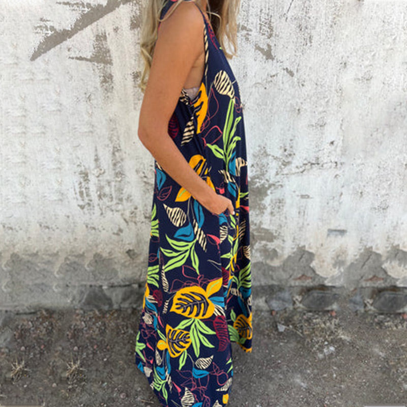 YLVA I MAXIKLEID MIT V-AUSSCHNITT